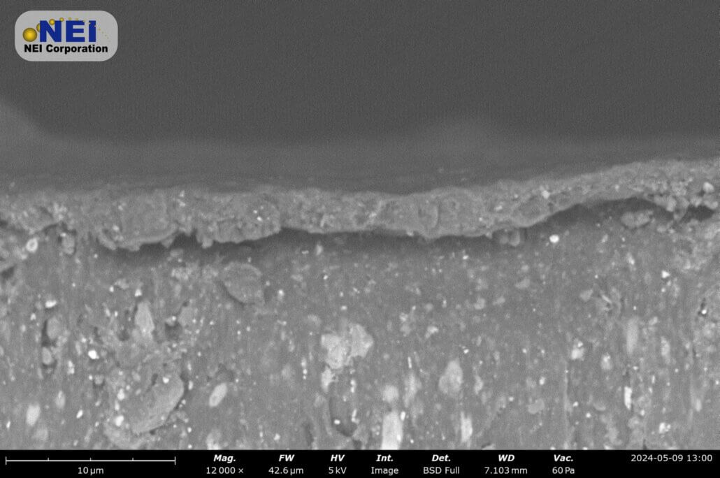 SEM image showing a cross-section of AM-100EC antimicrobial coating